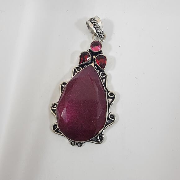 Handmade Sterling Silver Pendant with Faceted Ruby and Garnet Gemstone Accents - Picture 4 of 10